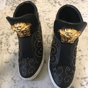 Versace high top sneaker.
